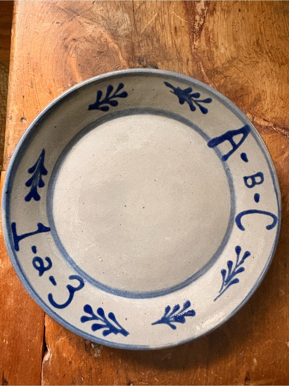 Blue and Cream Hand-Painted Ceramic Plate with A.B.C. Motif
